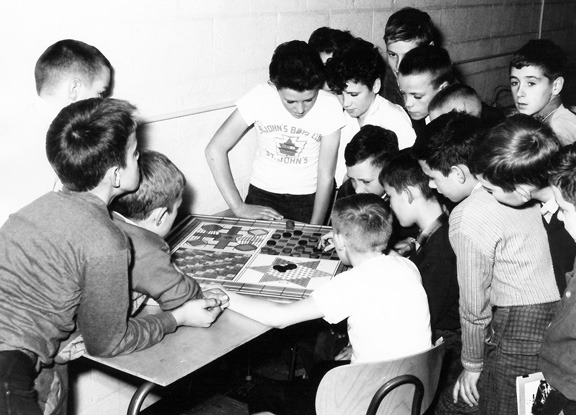 Old photo of youth on a swing