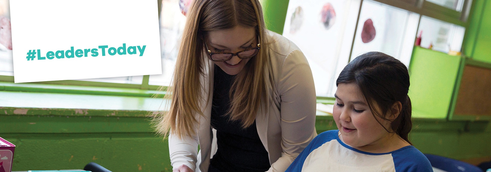 Teen girl mentoring young girl #LeadersToday