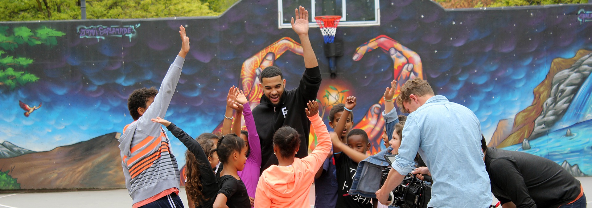 Toronto Raptor Cory Joseph plays basketball with Boys and Girls Club youth